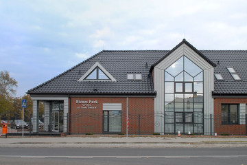 A building covered with anthracite engobe Monzaplus roof tile