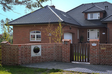 Single-family house made of Formback ight red shaded brick