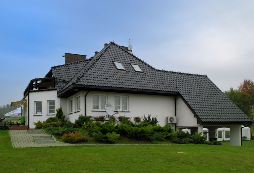 A single-family house covered with glazed tobago Monza tiles