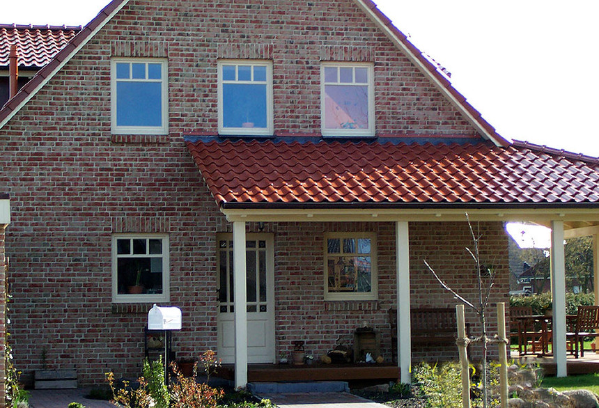 A single-family house covered with copper engobe Bornholm tiles