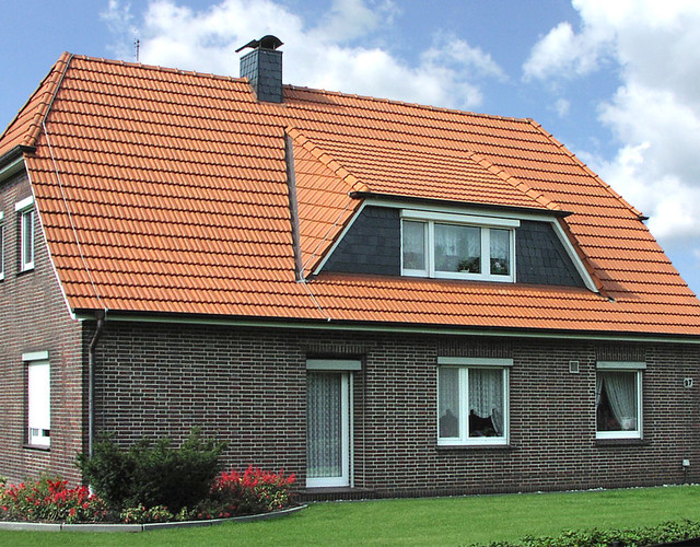 A single-family house covered with natural red Elsss tiles