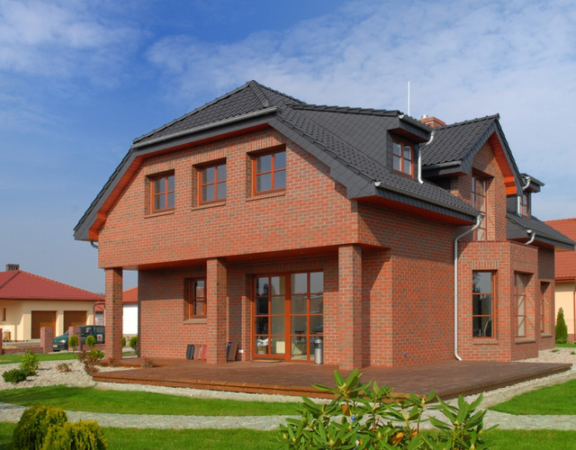 A single-family house covered with anthracite engobe Monzaplus roof tiles