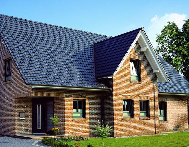 Single-family houses made of Moorbrand lehm shaded brick