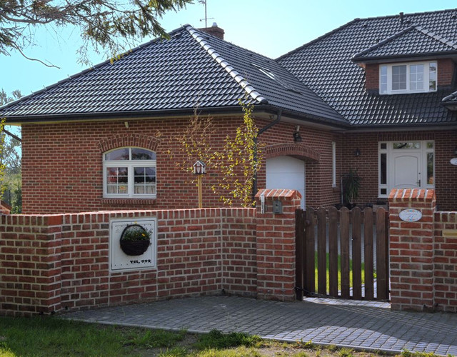 Single-family house made of Formback ight red shaded brick