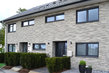 A residential building made of Yukon gray brick