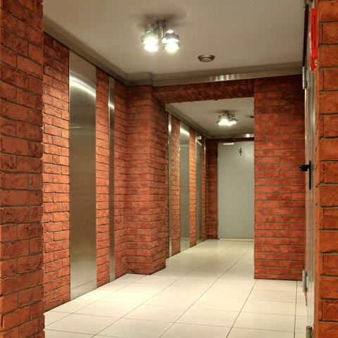 Hall made of light red shaded Formback tile