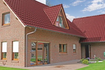  A single-family house covered with Piemont Trentino tile