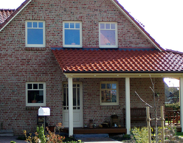 A single-family house covered with copper engobe Bornholm tiles