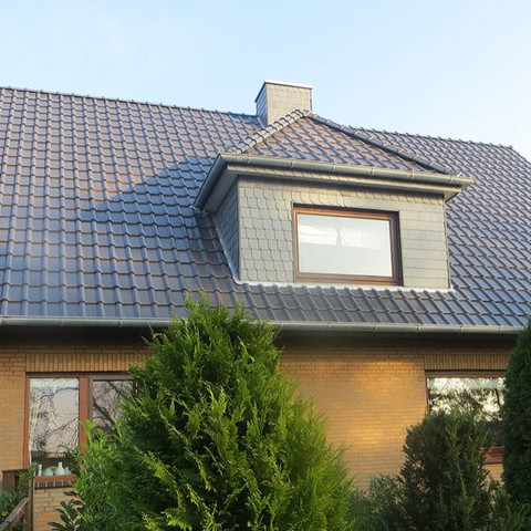  A single-family house covered with Piemont Titan tile