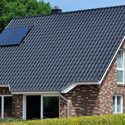 A single-family house covered Flandernplus tiles