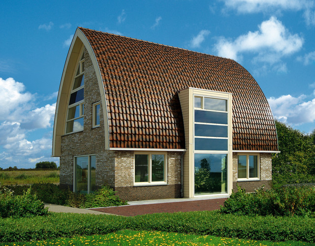 A modern house covered with rustic Piemont roof tiles