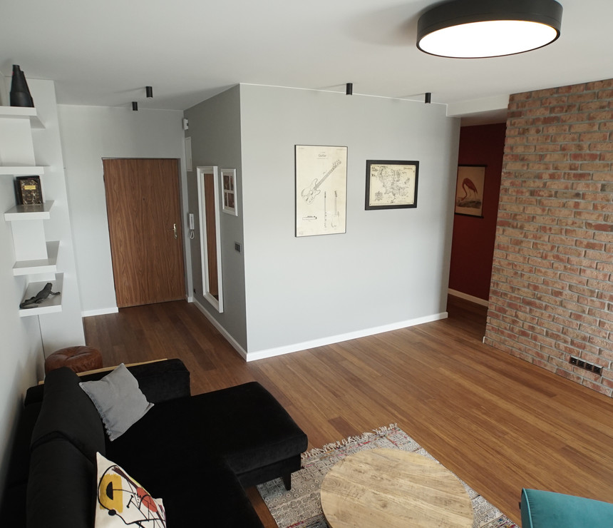 Living room with a brick wall